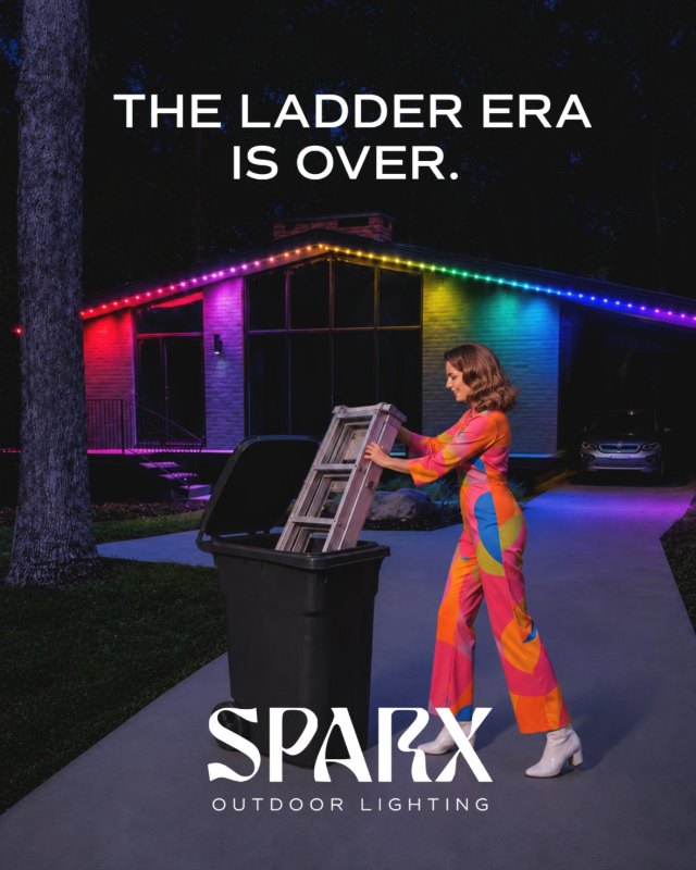 SPARX Outdoor Lighting ad: the ladder era is over, a woman tossing out a ladder in front of a lit home